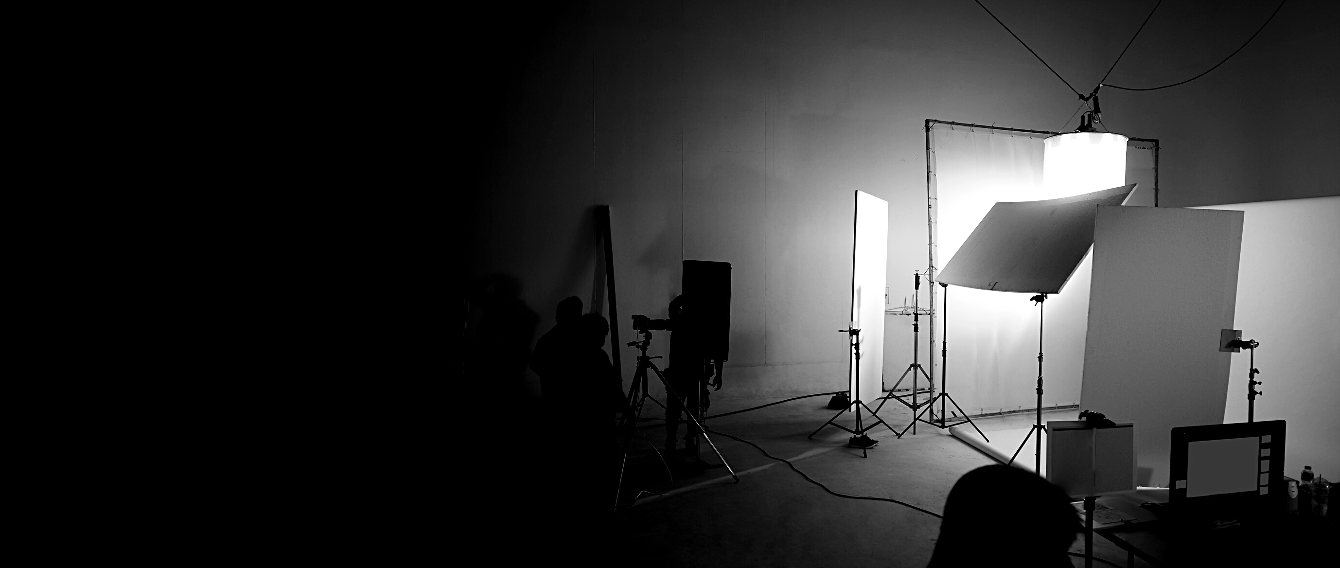 Silhouette production crew team working in photo shooting st